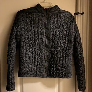 Reversible travel jacket